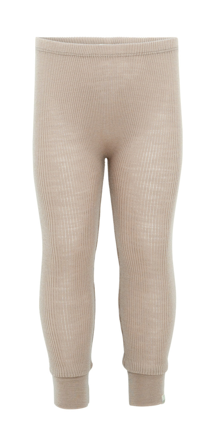 „minimalisma Leggings ‚Active‘ in Beige – Kinder-Leggings aus 100 % Merinowolle, nahtlos gestrickt, flach liegend auf hellem Hintergrund“