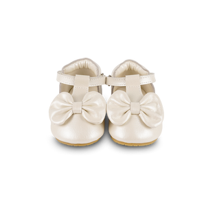 Donsje Babyschuh Meau Metallic Off White, Glattleder, runde Kappe mit Zierschleife, Klettverschluss, rutschfeste Sohle