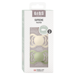 BIBS Supreme Silikon Schnuller 6–12 Monate 2er Pack Ivory/Sage – symmetrisches Saugteil mit breitem, belüftetem Schild und Glow-in-the-dark Effekt.