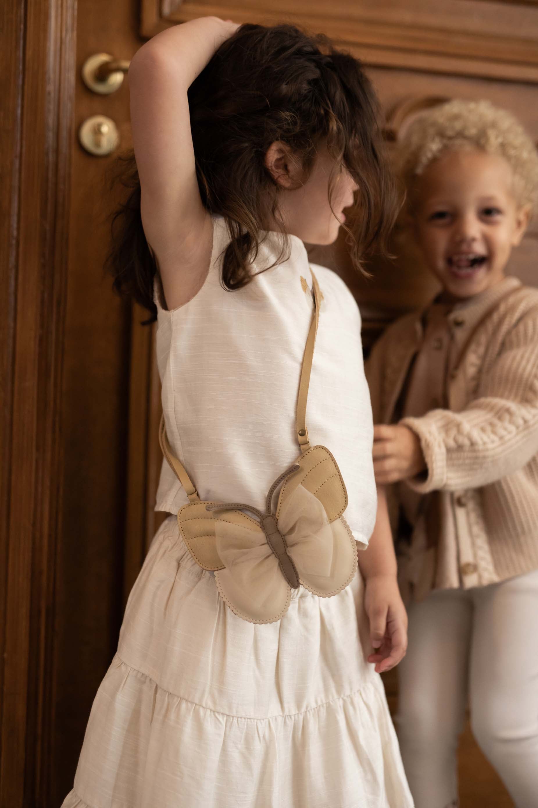 Donsje Umhängetasche "Qalja Vlinder" Gold Metallic