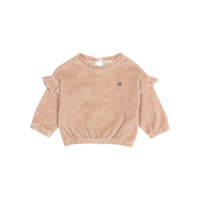 Rosa Samt-Sweatshirt von Búho für Kinder mit Blumenstickerei, Rüschen an den Schultern und Tropfenverschluss am Rücken.