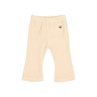 Flared Samtleggings in Ivory mit ausgestelltem Bein und feiner Blumenstickerei seitlich