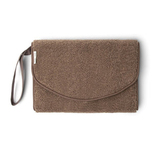 Studio Noos Teddy Wickelunterlage – weiche, faltbare Wickelunterlage aus Teddy-Stoff, tragbar und stilvoll, ideal für unterwegs und Zuhause.