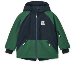 Kinder-Winterjacke „Kalle“ von Liewood in Navy und Grün mit wasserdichter Beschichtung, THERMOLITE®-Futter und Skikartentasche