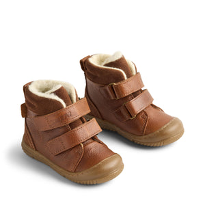 Winterboots Snug Tex für Babys in Cognac mit Wollfutter, Tex-Membran und Klettverschlüssen.