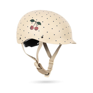Kinder-Fahrradhelm „Navy Dot“ von Konges Sløjd – modernes Design mit Belüftungsschlitzen und verstellbarem Kinnriemen für optimalen Schutz.