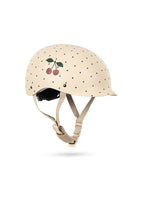 Kinder-Fahrradhelm „Navy Dot“ von Konges Sløjd – modernes Design mit Belüftungsschlitzen und verstellbarem Kinnriemen für optimalen Schutz.