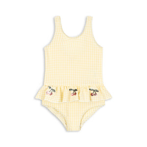 Konges Sløjd Etta Swimsuit Banana Almond Check, Kinder-Badeanzug mit Rüschen und Kirsch-Pailletten