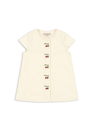 Konges Sløjd Kleid Evia Cherry Cloud Cream aus Bio-Baumwolle mit Kirschmotiv