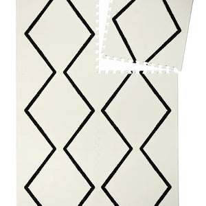eeveve Spielmatte „Beni“ in Ecru – elegante, gepolsterte Puzzlematte mit modernem Design, gefertigt aus hochwertigem, ungiftigem EVA-Schaum.
