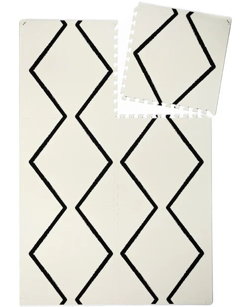 eeveve Spielmatte „Beni“ in Ecru – elegante, gepolsterte Puzzlematte mit modernem Design, gefertigt aus hochwertigem, ungiftigem EVA-Schaum.
