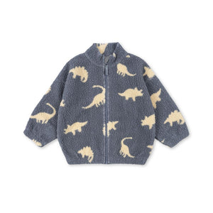 Konges Sløjd Fleecejacke „Jody“ aus Teddy-Fleece im Design Dino Mist – weiche Kinderjacke mit verspieltem Dino-Muster in sanften Naturtönen.