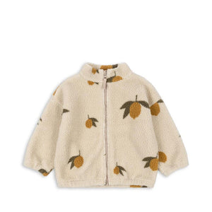 Fleecejacke „Jody“ Teddy von Konges Sløjd in Natur mit Zitronen-Detail – kuscheliger Kinder-Fleece aus recyceltem Material.